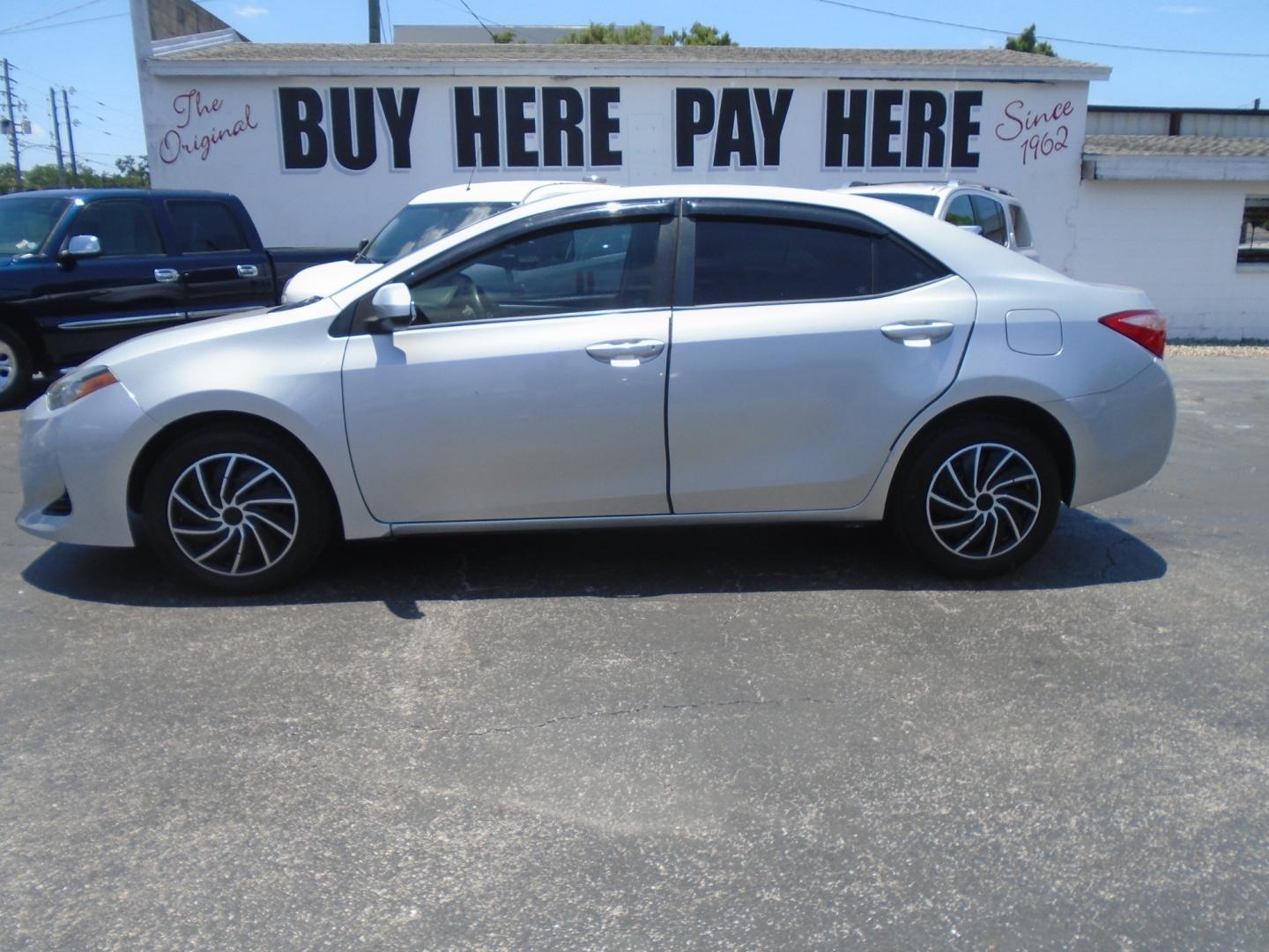 2017 SILVER Toyota Corolla L CVT (2T1BURHE1HC) with an 1.8L L4 DOHC 16V engine, CVT transmission, located at 6112 N Florida Avenue, Tampa, FL, 33604, (888) 521-5131, 27.954929, -82.459534 - Photo#0